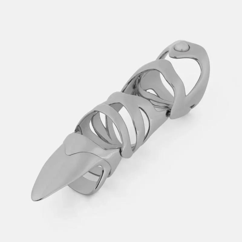 Silver alloy punk armour finger stall fashion ring on a black background.