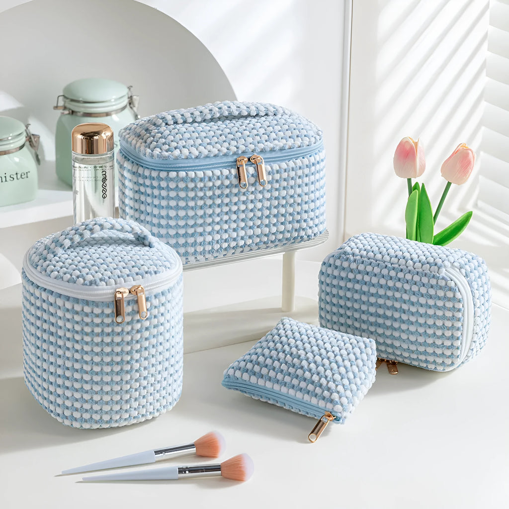 Flannelette makeup bag four-piece set in cube style, shown in blue with dots colour.