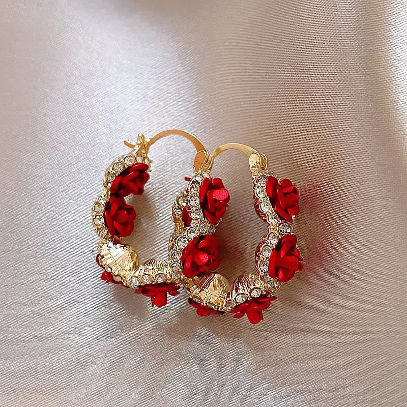 Red floral alloy clip earrings with rose design for women