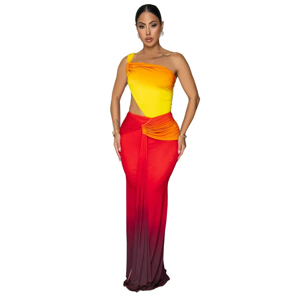 Women's long sleeveless dress with cross-shoulder neckline in a green gradient colour pattern.