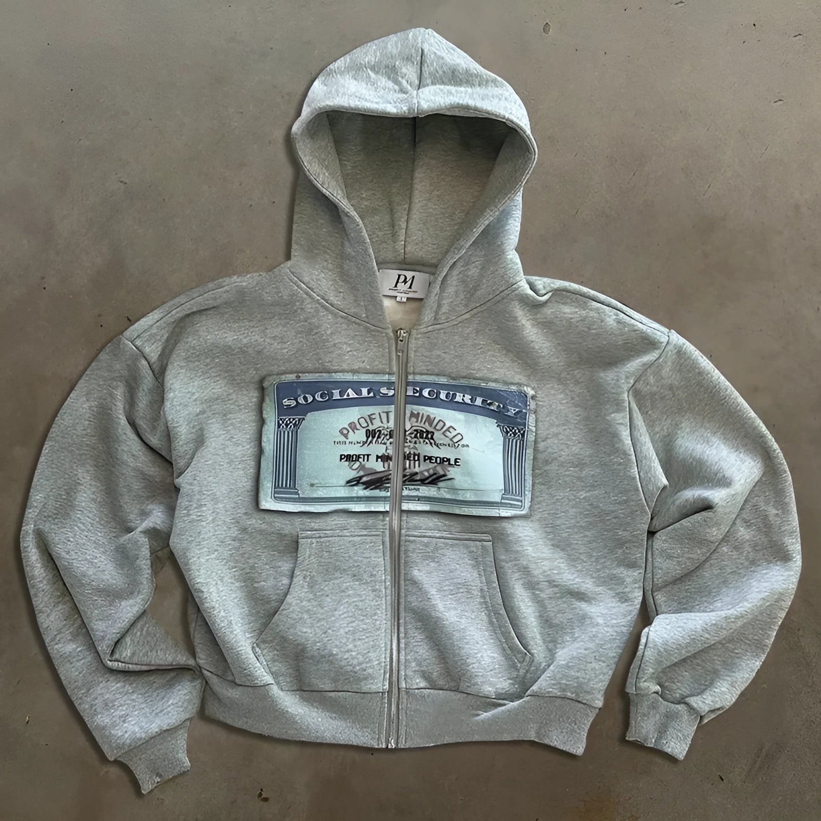 Unisex hoodie zipper jacket with letter pattern design in black colour showing zippered front and pockets