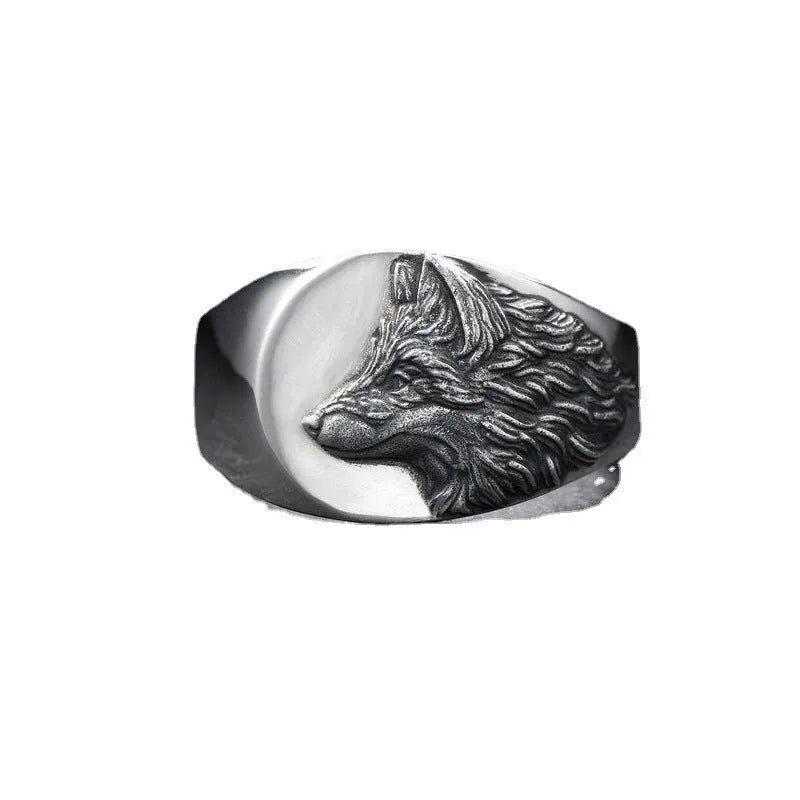 Men's silver geometric wolf head ring in retro style, showing angular alloy construction.