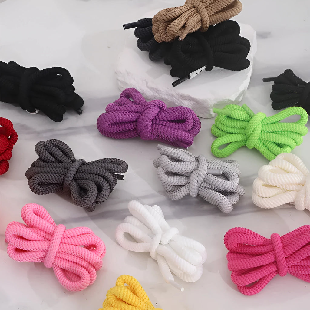 Set of elastic oval polyester shoelaces in multiple colours showing 1.0cm width and length options from 120cm to 160cm