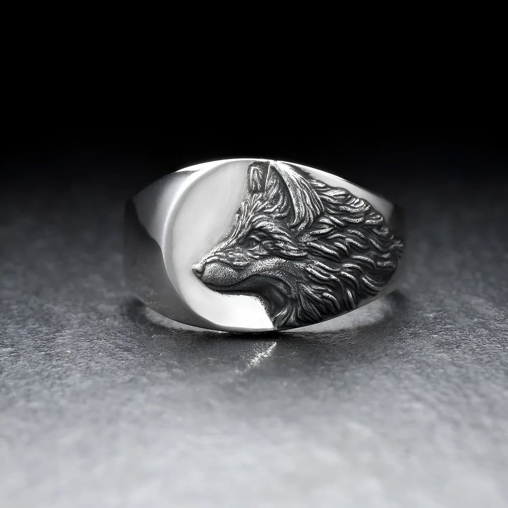 Men's silver geometric wolf head ring in retro style, showing angular alloy construction.