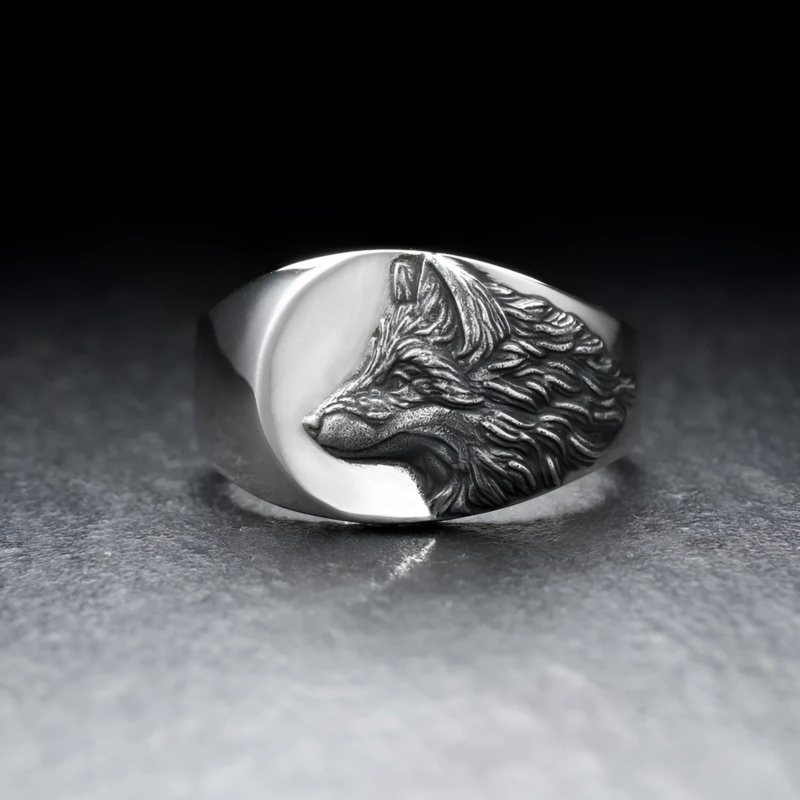 Men's silver geometric wolf head ring in retro style, showing angular alloy construction.