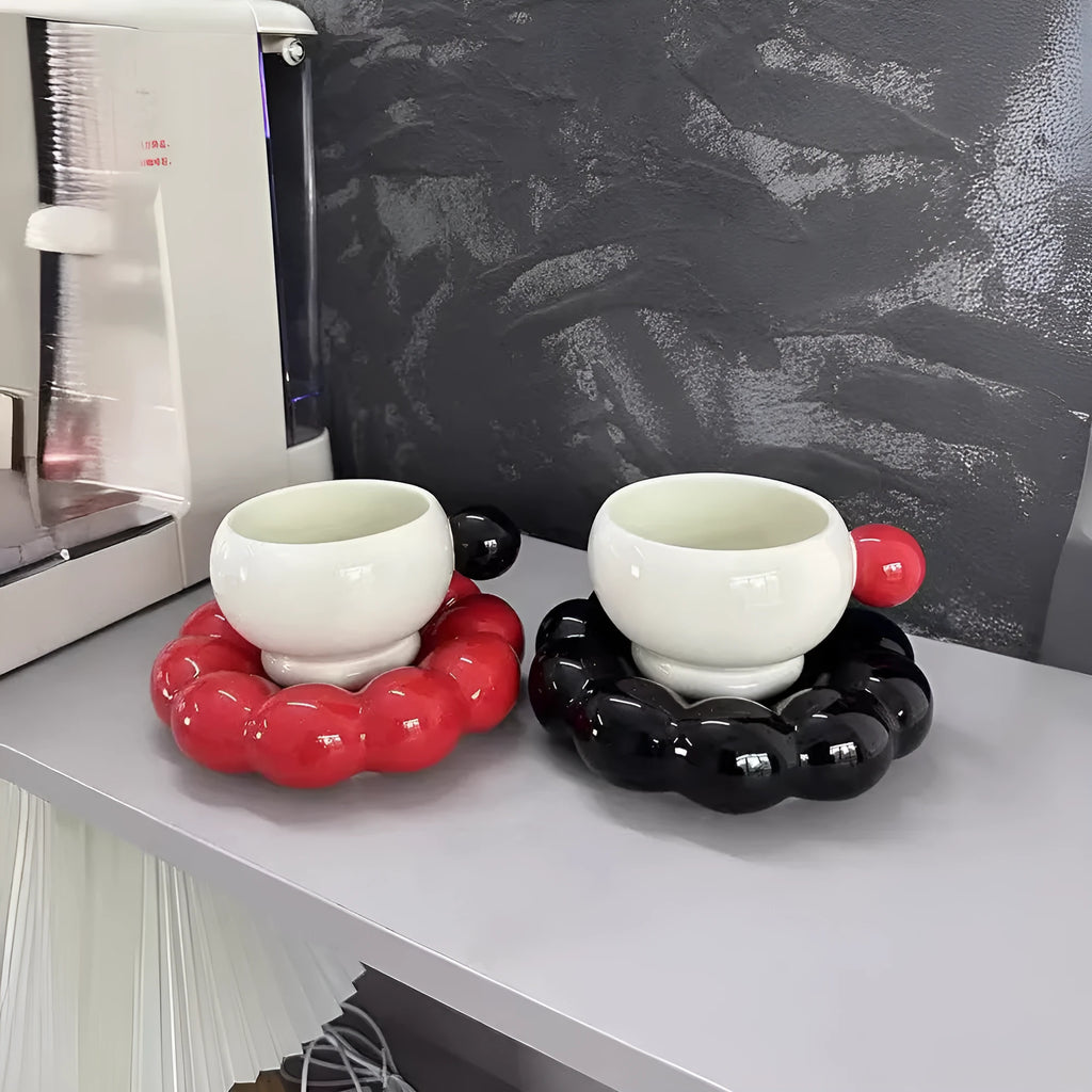 Ceramic coffee cup and saucer set in a Nordic style, shown in one of five solid colour options.