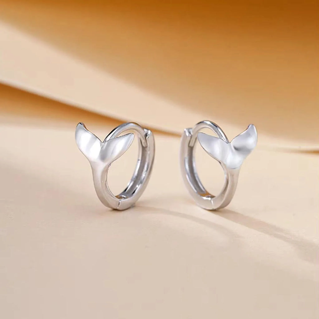 Women's fishtail design copper earrings with electroplated finish in white gold or yellow gold colour