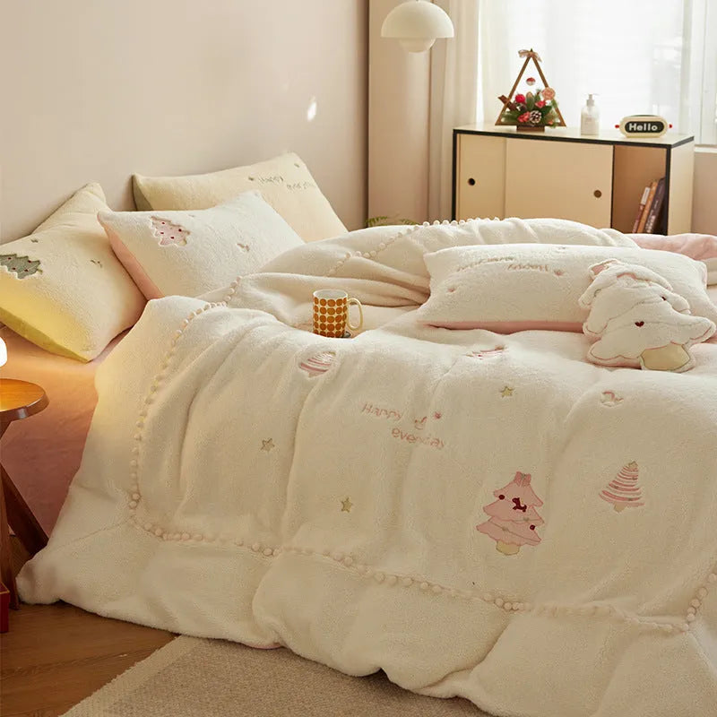 Winter milk fibre bedding four-piece set with green Christmas tree reactive print on a quilt cover and pillowcase.