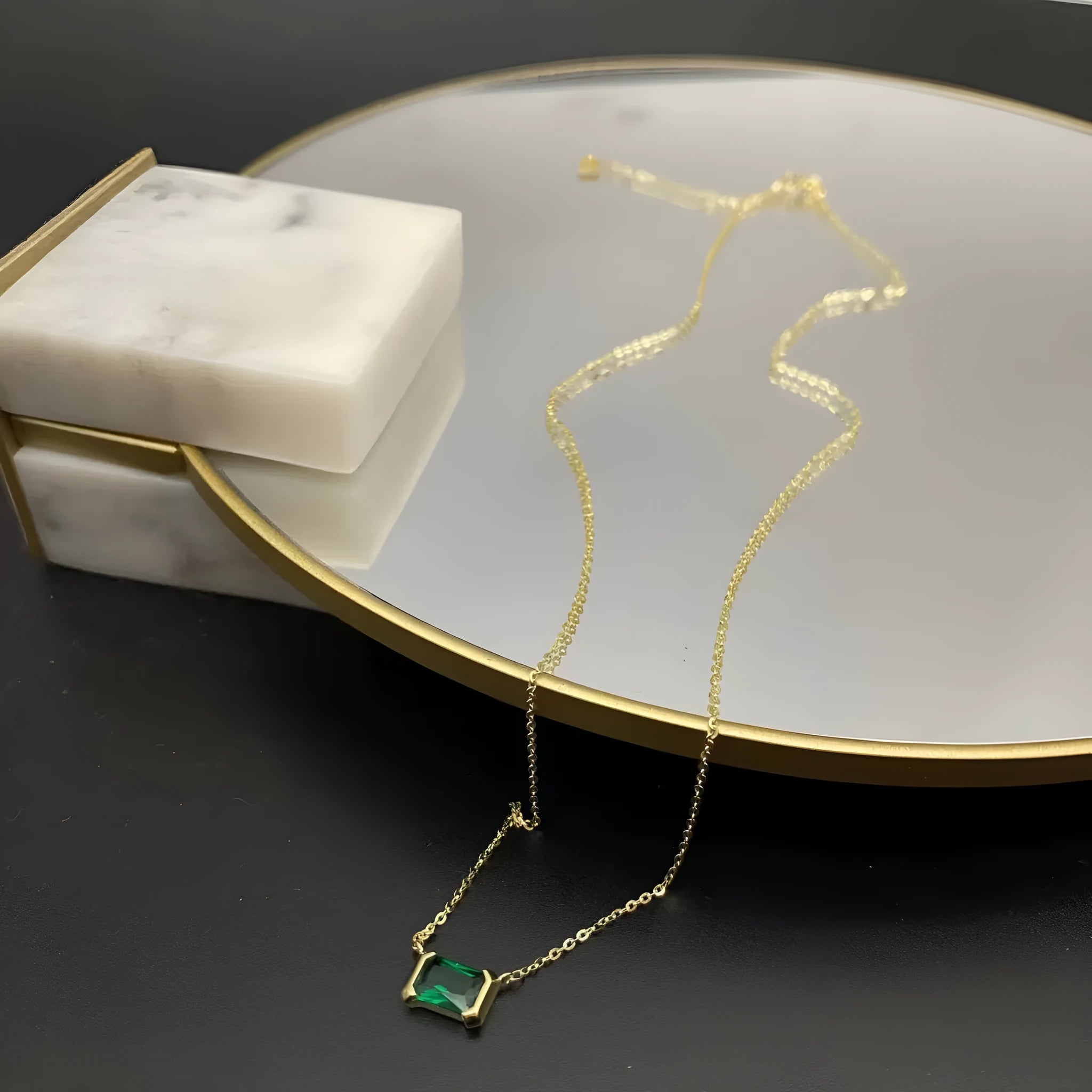 Gold geometric pendant necklace with quadrilateral design and inlaid Lvzuan stones on chain