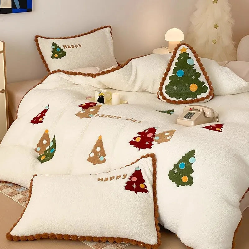 Bright yellow fleece-lined Christmas tree cartoon pattern quilt cover and pillowcases from a four-piece bedding set.