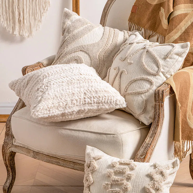 Printed sofa cushion cover with knitted tassel trim in a choice of six patterns and two sizes.