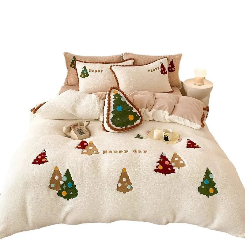 Bright yellow fleece-lined Christmas tree cartoon pattern quilt cover and pillowcases from a four-piece bedding set.