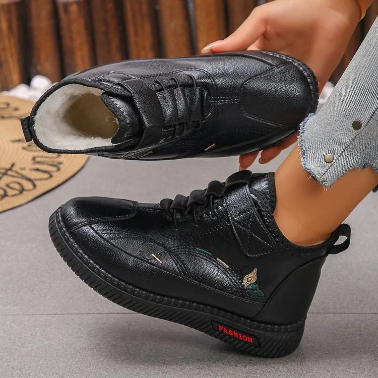 Women's black velvet slippers with cotton lining and rubber sole, low-cut design with hollow-out details