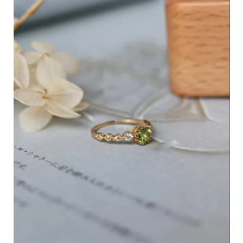 Copper ring with a quadrilateral geometric shape, Japanese style design, shown on a finger.