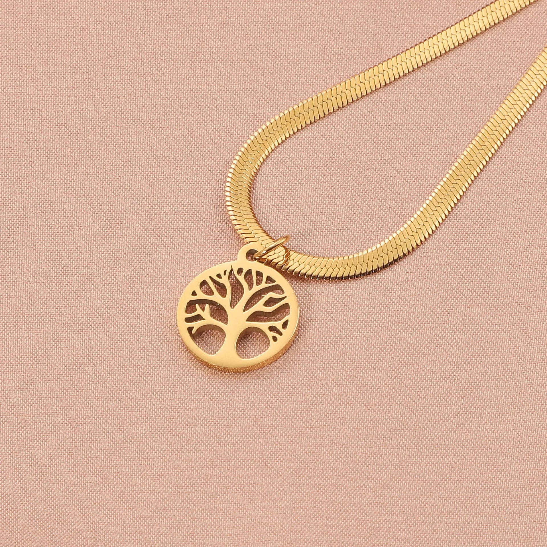 Stainless steel clavicle chain with tree pendant on snake bone chain in gold or steel colour.