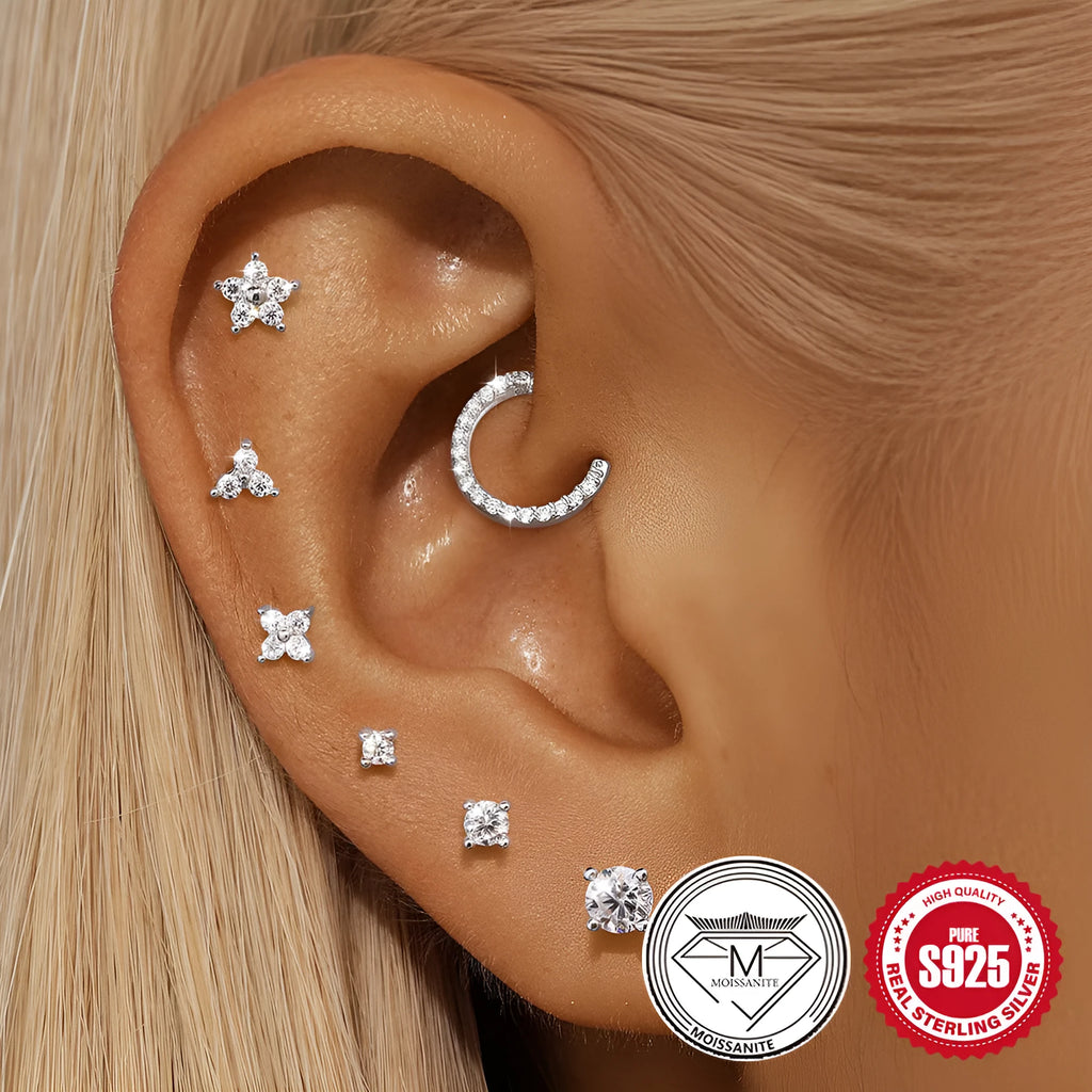 Platinum-plated S925 sterling silver stud earrings showing geometric, petal, and plain stud designs.