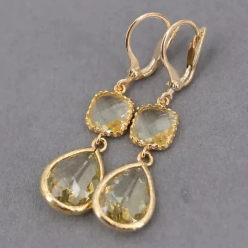 Gold retro geometric earrings with long fringe and water droplet design elements