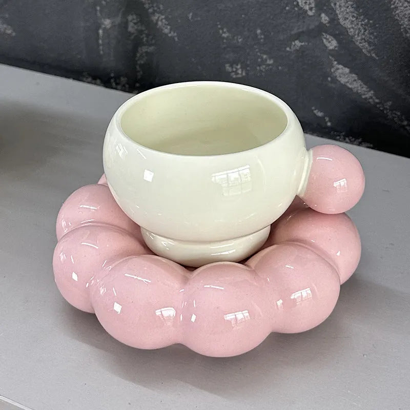 Ceramic coffee cup and saucer set in a Nordic style, shown in one of five solid colour options.
