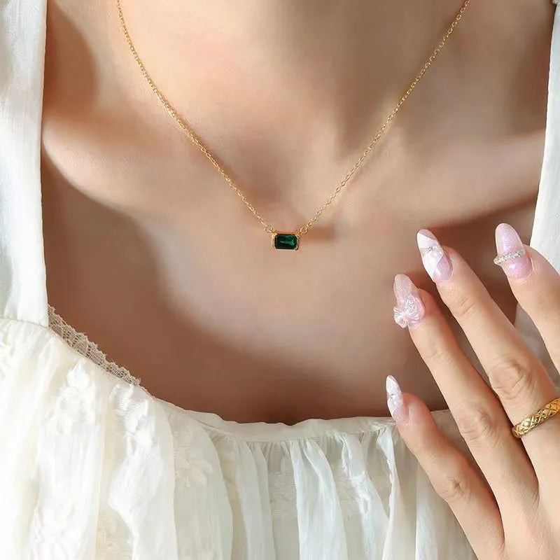 Gold geometric pendant necklace with quadrilateral design and inlaid Lvzuan stones on chain