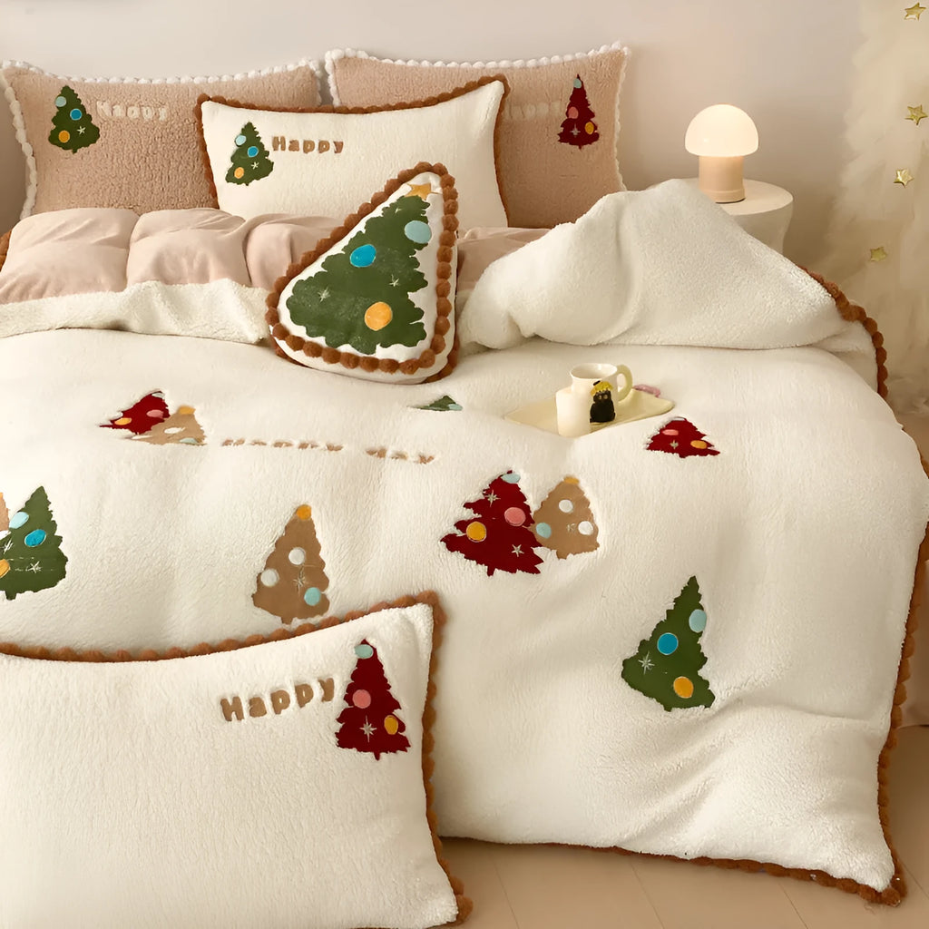 Bright yellow fleece-lined Christmas tree cartoon pattern quilt cover and pillowcases from a four-piece bedding set.