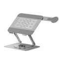Silver carbon steel laptop stand in rotated position with a magnetic phone holder attached to the side.