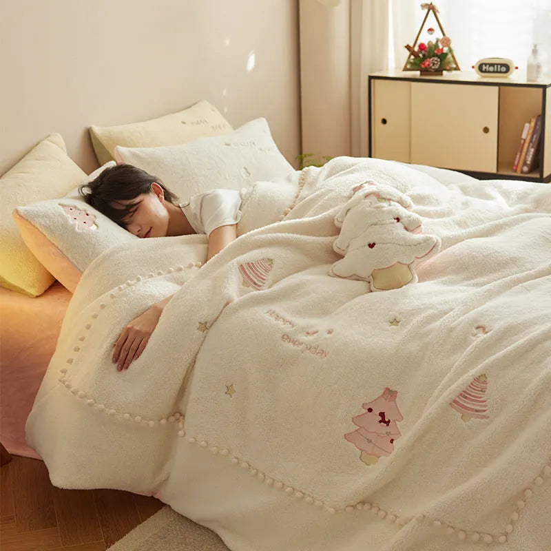 Winter milk fibre bedding four-piece set with green Christmas tree reactive print on a quilt cover and pillowcase.