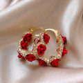 Red floral alloy clip earrings with rose design for women