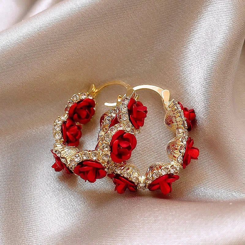Red floral alloy clip earrings with rose design for women