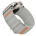 Elastic nylon Apple Watch band with stainless steel buckle shown in Army Green colour.