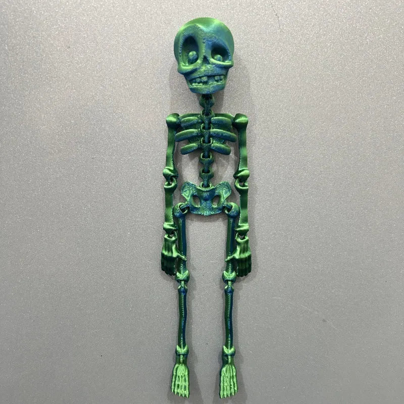 Large white 3D printed skull fridge magnet on a refrigerator door.