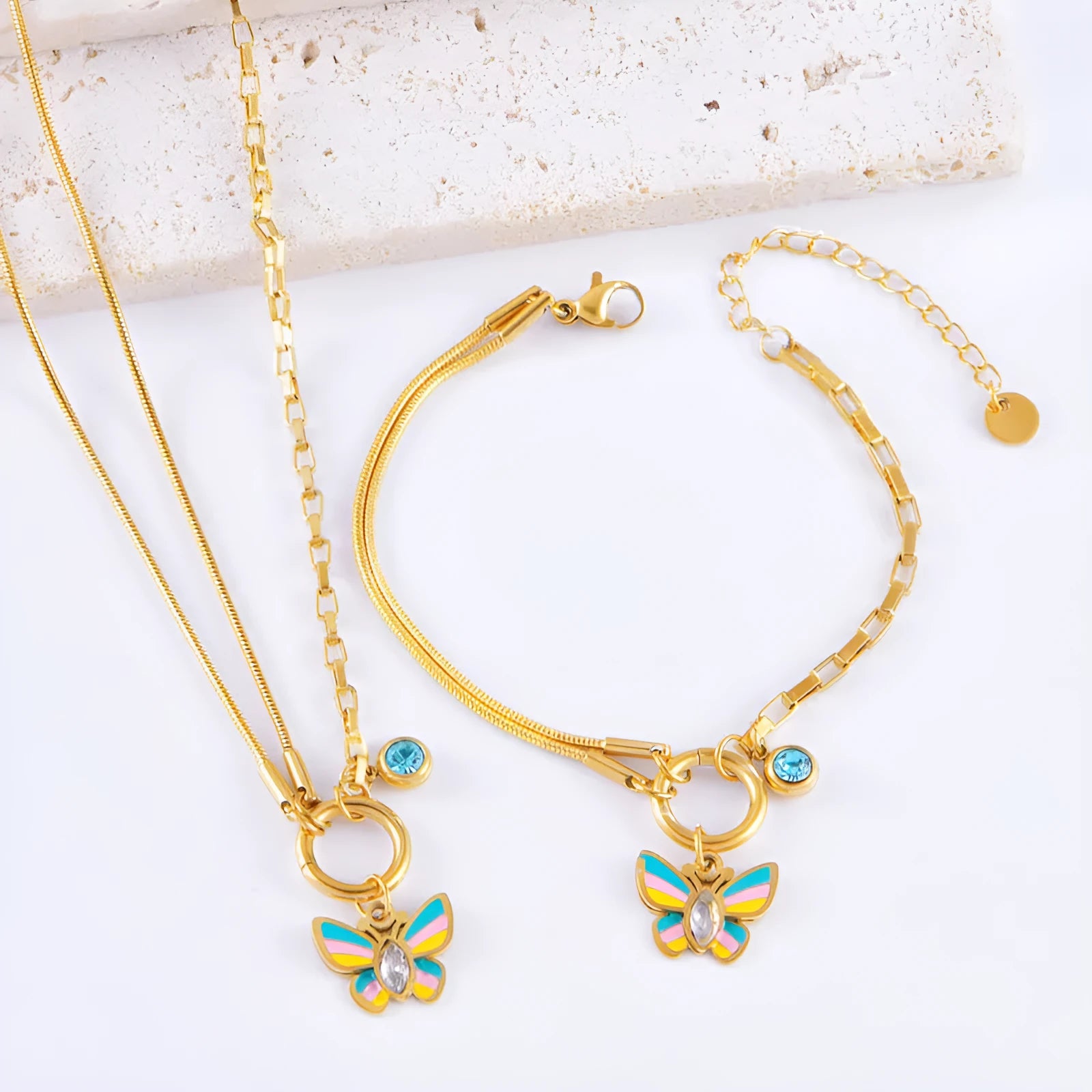 Gold titanium steel butterfly necklace and bracelet set with colourful epoxy detailing on animal pendant