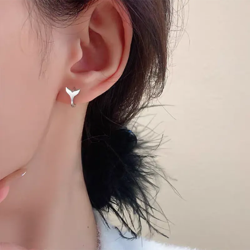 Women's fishtail design copper earrings with electroplated finish in white gold or yellow gold colour