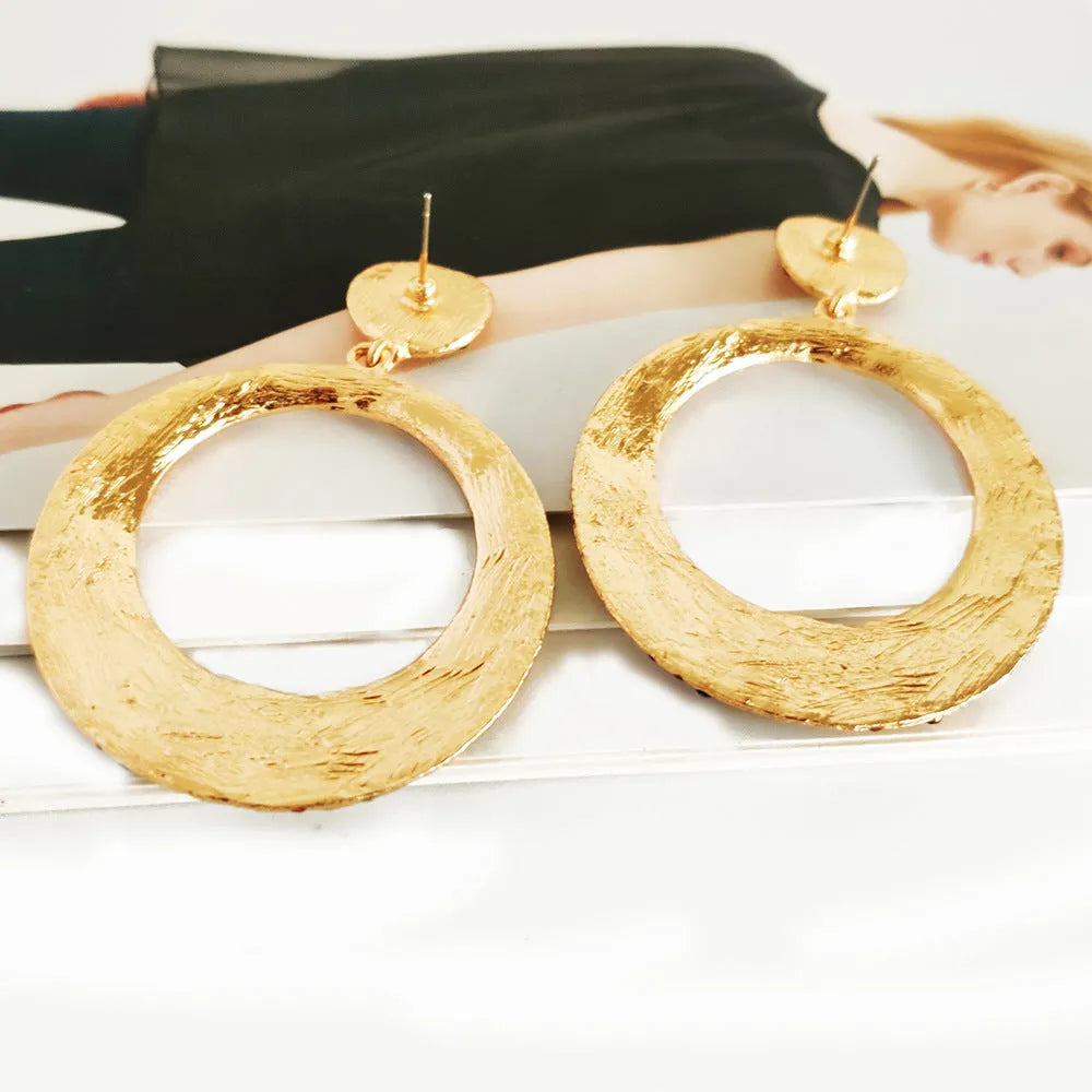 Cartoon style alloy earrings with large round colour pendants