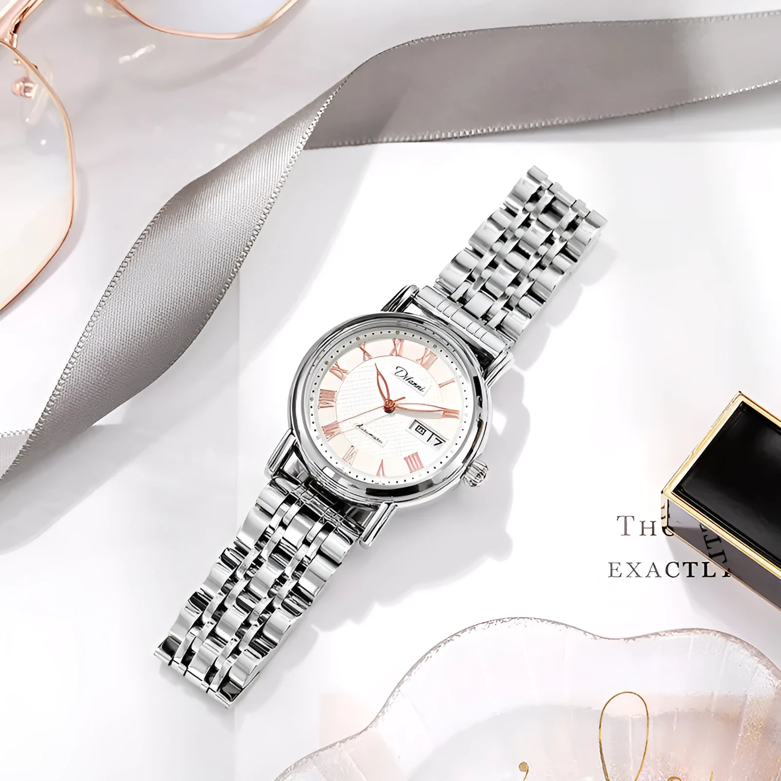 Women's automatic mechanical watch with a choice of steel bracelet or leather strap and white or black dial.