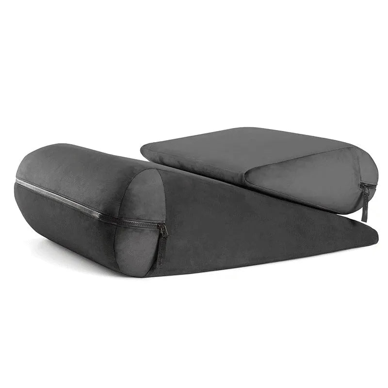 High density sponge triangle support pillow in an embroidered fabric, shown in a choice of colours.