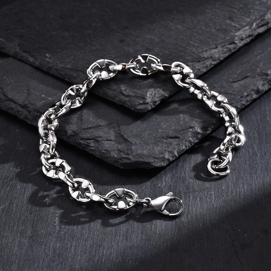 Stainless steel geometric thick chain bracelet with handmade links, steel colour finish