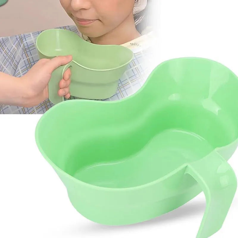Green plastic gargle cup for bedridden patient oral care assistance