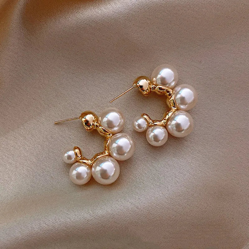 Red alloy earrings with hanging bell charm for women, also available in white