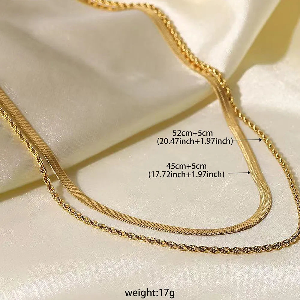 Geometric double layer twist necklace with titanium steel pendant on an adjustable snake bones chain.