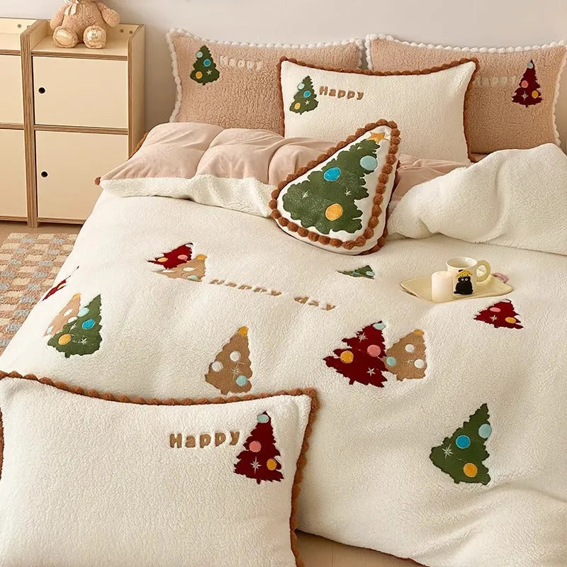 Bright yellow fleece-lined Christmas tree cartoon pattern quilt cover and pillowcases from a four-piece bedding set.