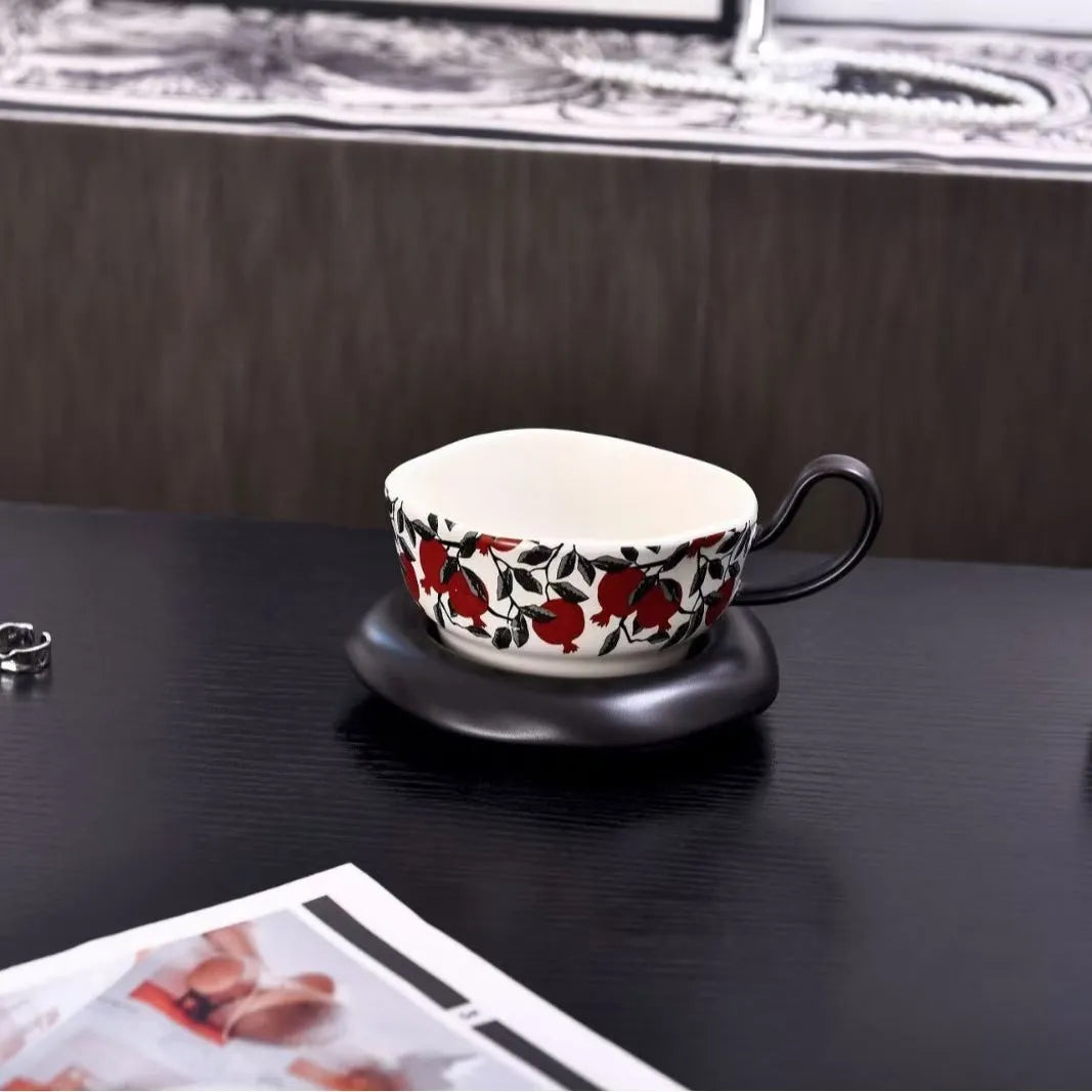 Antique-style ceramic coffee cup and saucer set with 210ml capacity in black or orange retro designs.