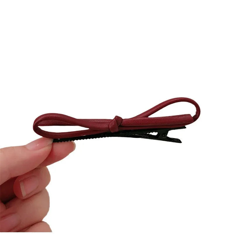 Wine red leather bow barrette hair clip for women, single piece or pair.