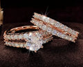 Women's 2-in-1 ring set showing both geometric fashion ring and fully-jewelled ring in gold colour