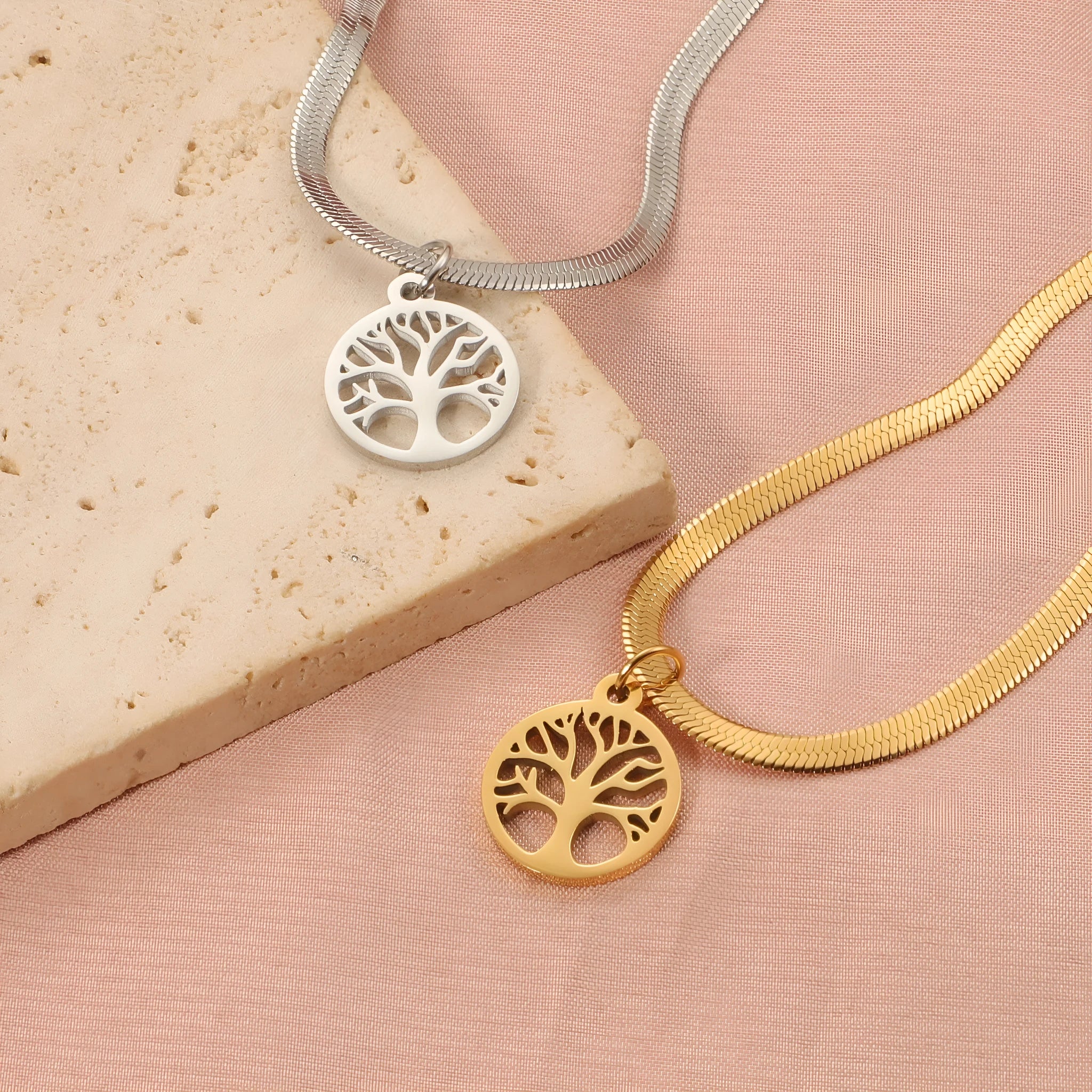 Stainless steel clavicle chain with tree pendant on snake bone chain in gold or steel colour.