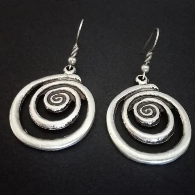 Silver geometric spiral distressed earrings with vintage ethnic style design