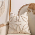 Printed sofa cushion cover with knitted tassel trim in a choice of six patterns and two sizes.