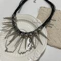 Women's casual leather necklace with round electroplated rivet beads and winding tassel detail