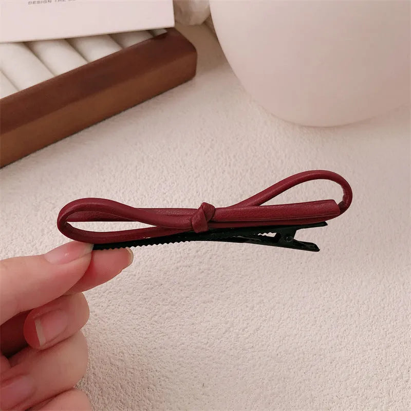 Wine red leather bow barrette hair clip for women, single piece or pair.