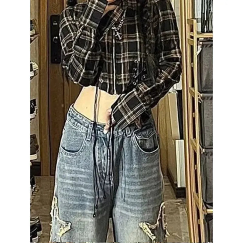Blue women's high waist straight leg jeans on a neutral background.