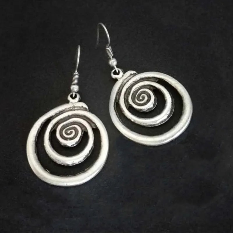 Silver geometric spiral distressed earrings with vintage ethnic style design